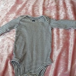 Long sleeved navy blue and white striped onesie